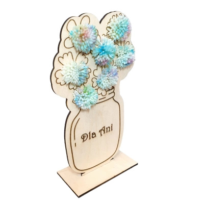 Wooden bouquet of blue flowers with dedication