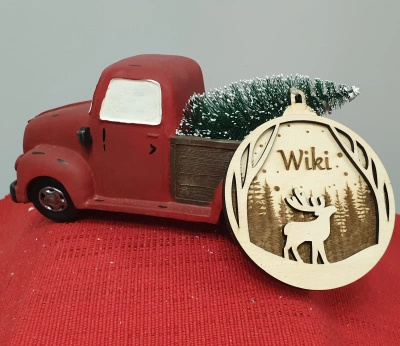 Wooden bauble with engraving "Reindeer" - 10cm